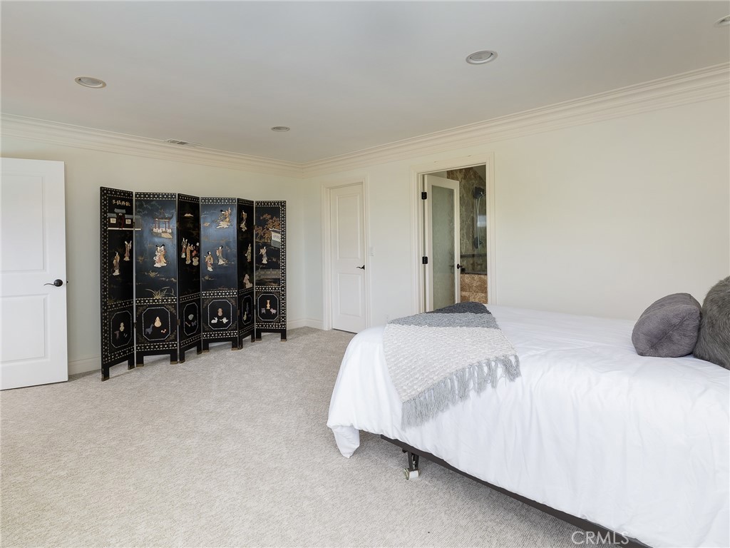 8 Stallion Road Rancho Palos Verdes, CA 90275 - Photo 28 of 56 a bedroom with bed and window