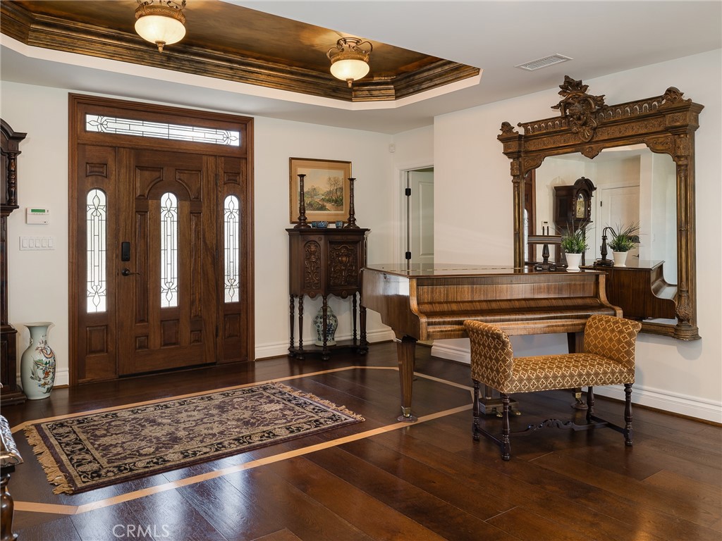 8 Stallion Road Rancho Palos Verdes, CA 90275 - Photo 3 of 56 a living room with furniture and wooden floor