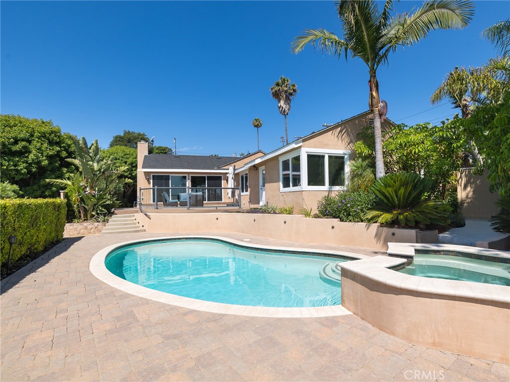 8 Stallion Road Rancho Palos Verdes, CA 90275 - Photo 40 of 56 a view of house with swimming pool and a sitting area