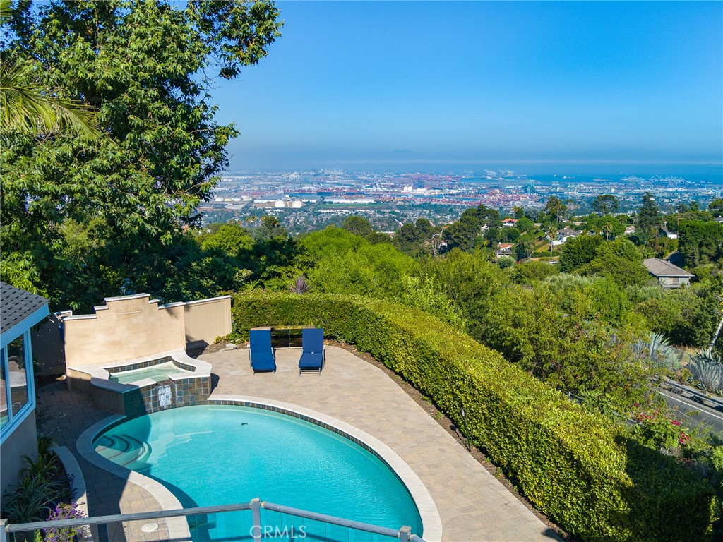 8 Stallion Road Rancho Palos Verdes, CA 90275 - Photo 43 of 56 a view of a terrace with a garden and mountain view