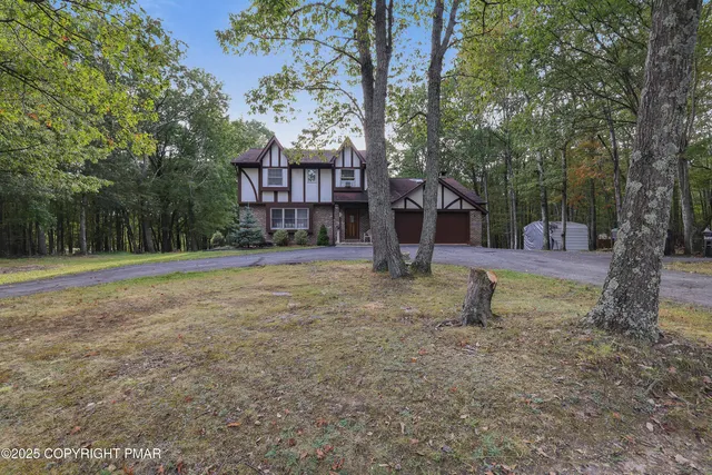 a backyard of a house with entertaining space