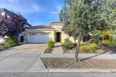 a view of a livingroom with an empty space and a window