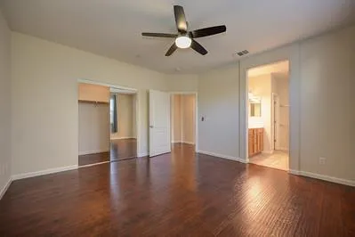 a bathroom with a sink a vanity and a mirror