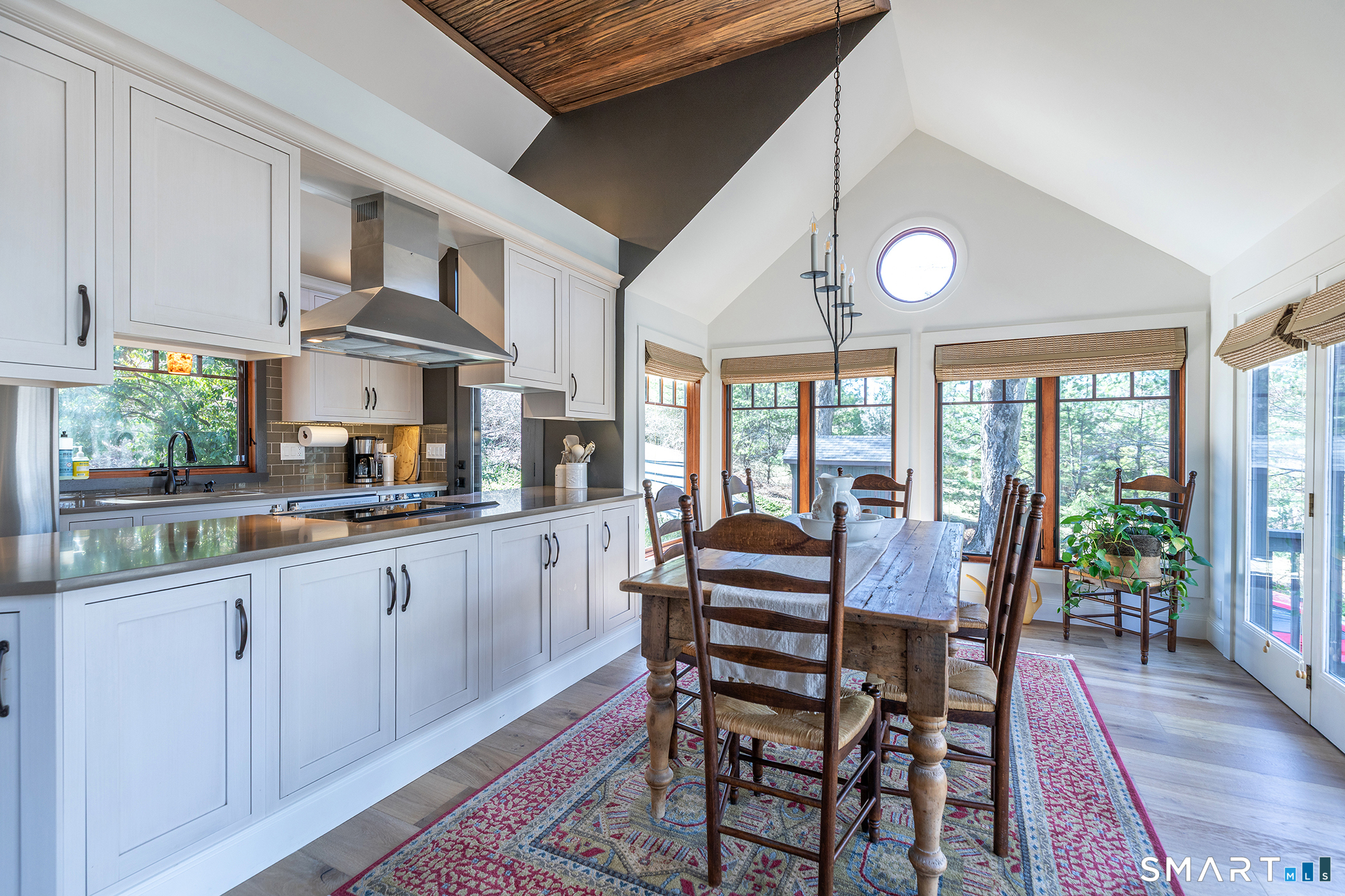 45 Big Trail Sherman, CT 06784 - Photo 11 of 36 a view of a dining room with furniture window and wooden floor