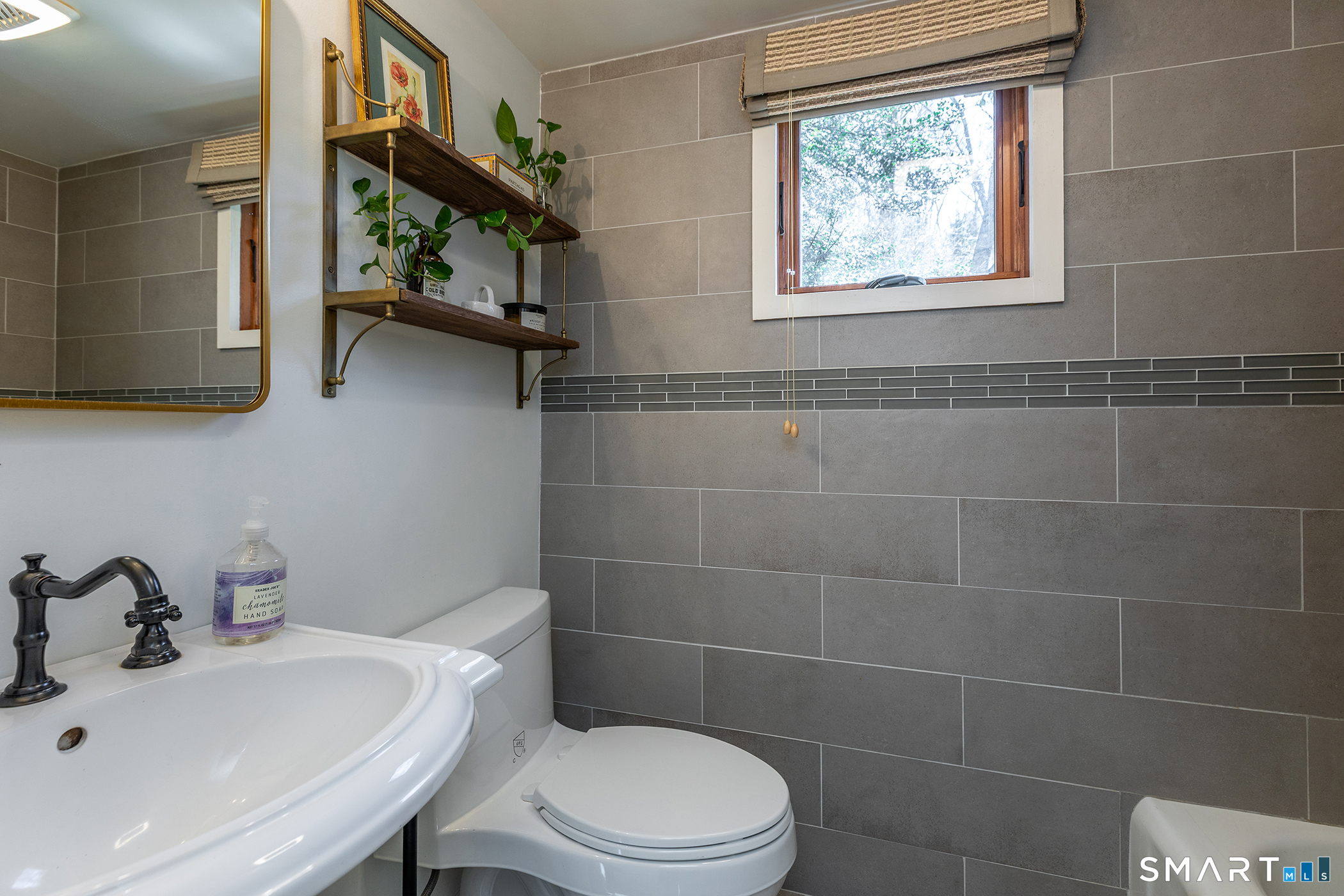 45 Big Trail Sherman, CT 06784 - Photo 24 of 36 a bathroom with a sink a toilet and a mirror