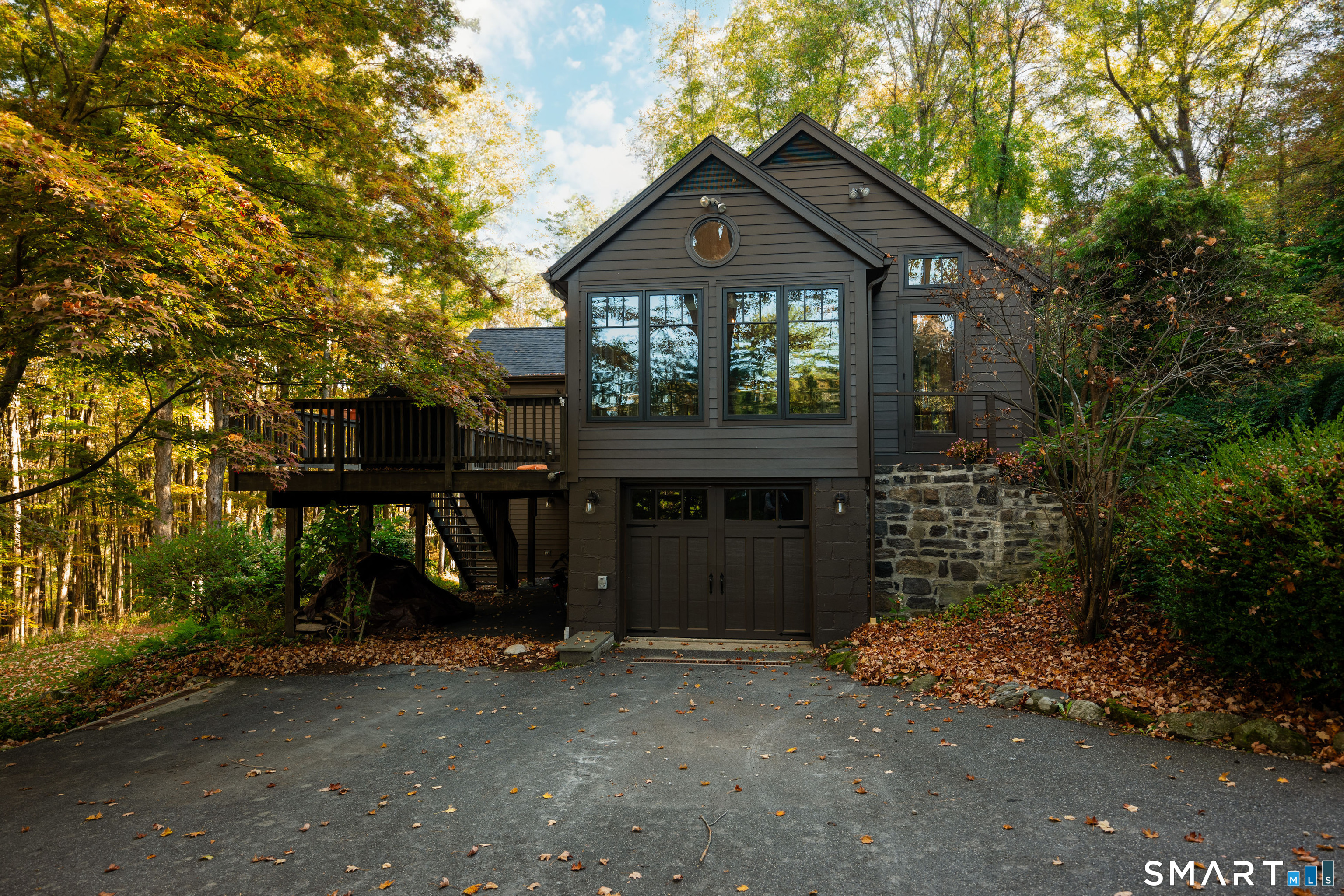 45 Big Trail Sherman, CT 06784 - Photo 33 of 36 a front view of a house with a yard