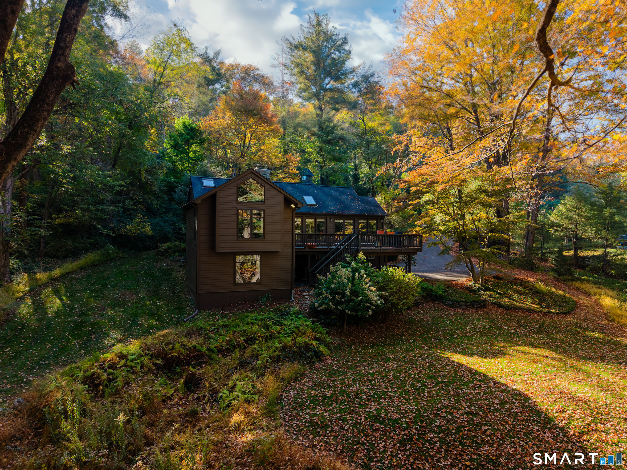45 Big Trail Sherman, CT 06784 - Photo 34 of 36 a view of a house with a yard and a large tree