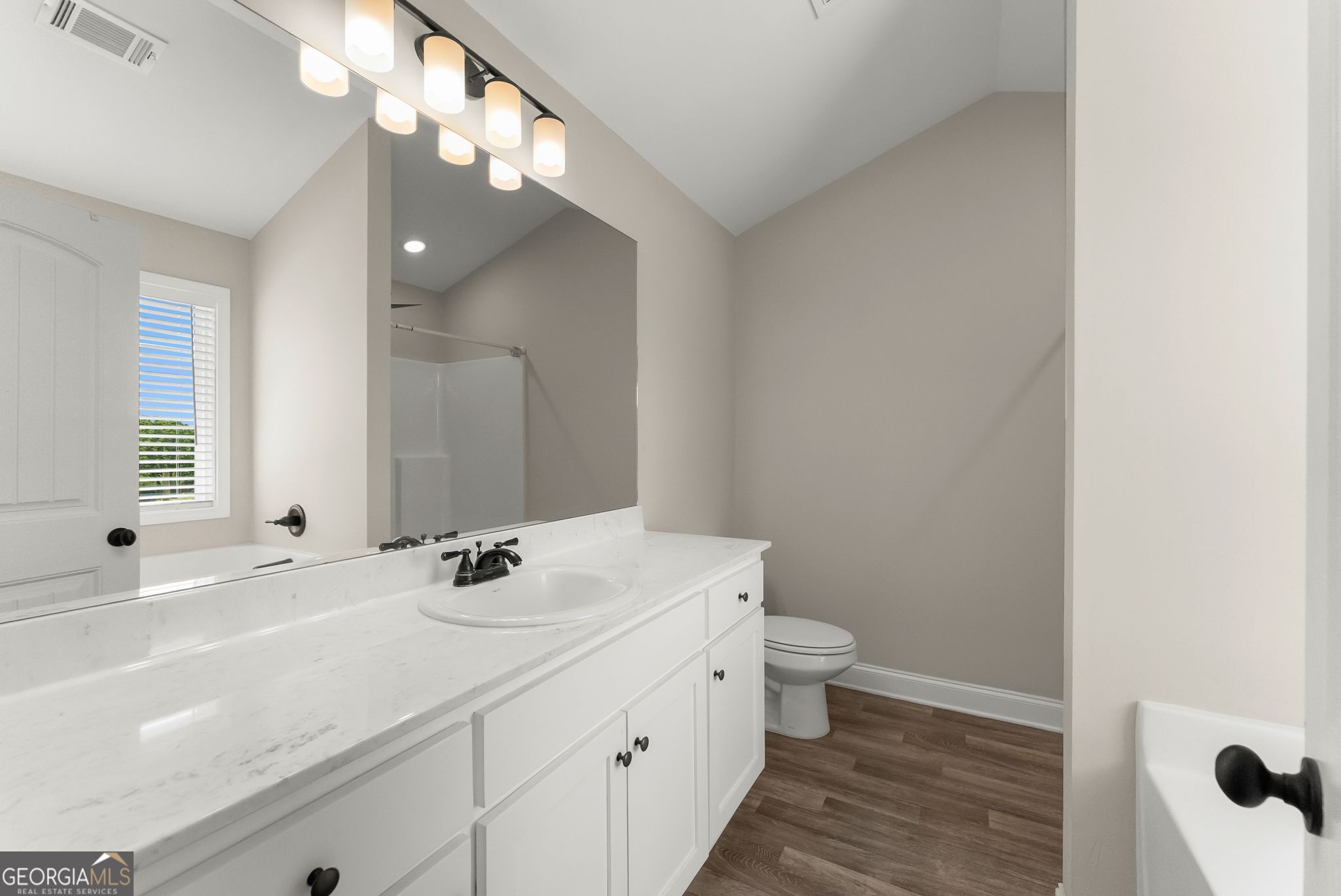 810 Anderson Thomas Road Martin, GA 30557 - Photo 25 of 40 a bathroom with a sink and a mirror