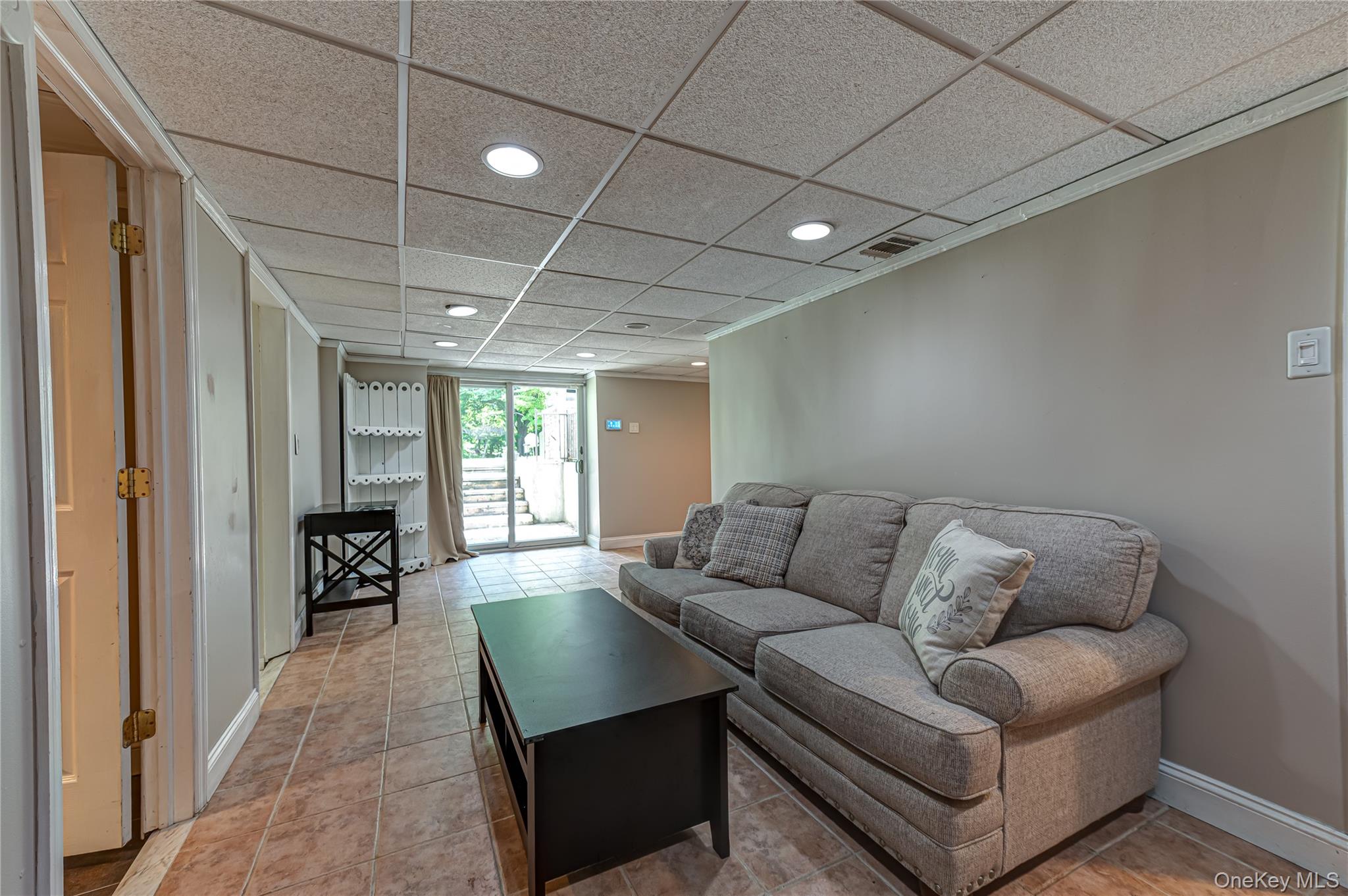 3 Thompson Hill Road St. James, NY 11780 - Photo 22 of 34 a living room with furniture and a couch
