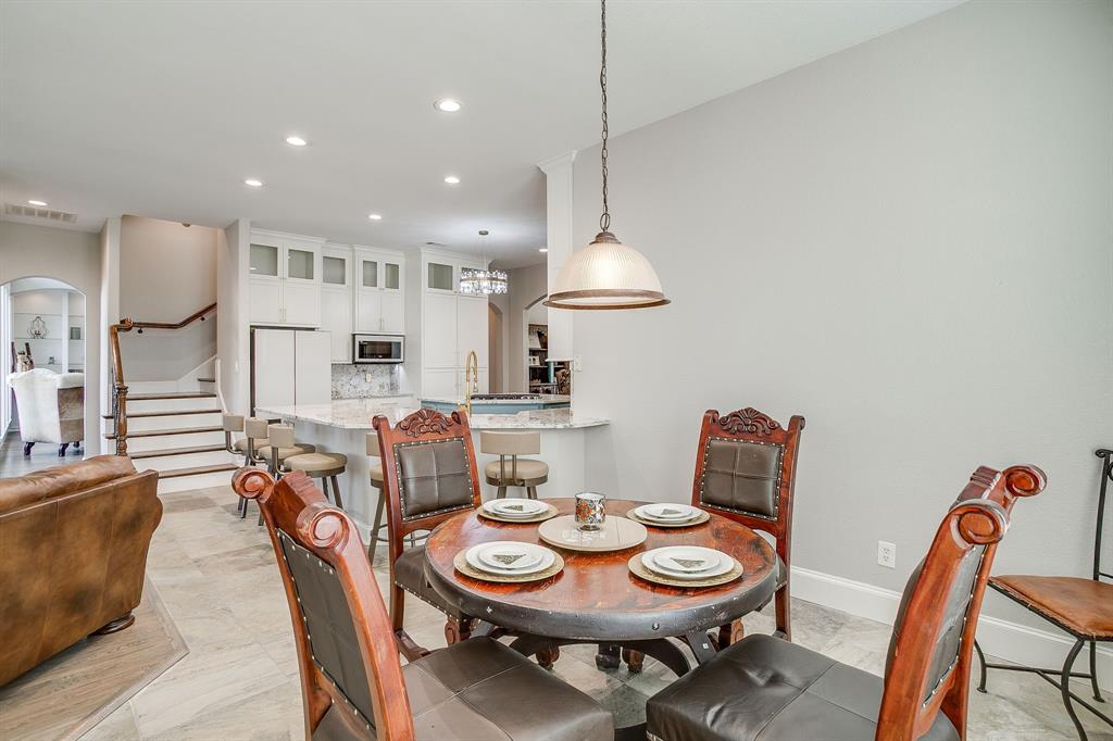 253 Bayne Road Haslet, TX 76052 - Photo 18 of 40 a view of a dining room with furniture