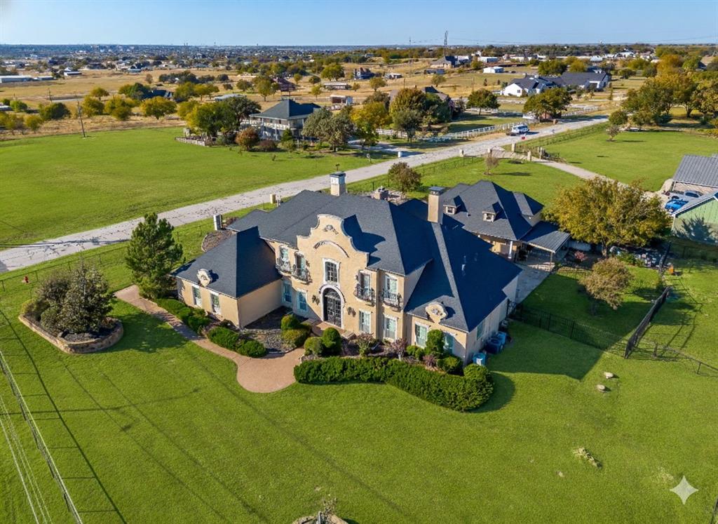 253 Bayne Road Haslet, TX 76052 - Photo 2 of 40 an aerial view of a house with outdoor space swimming pool and ocean view