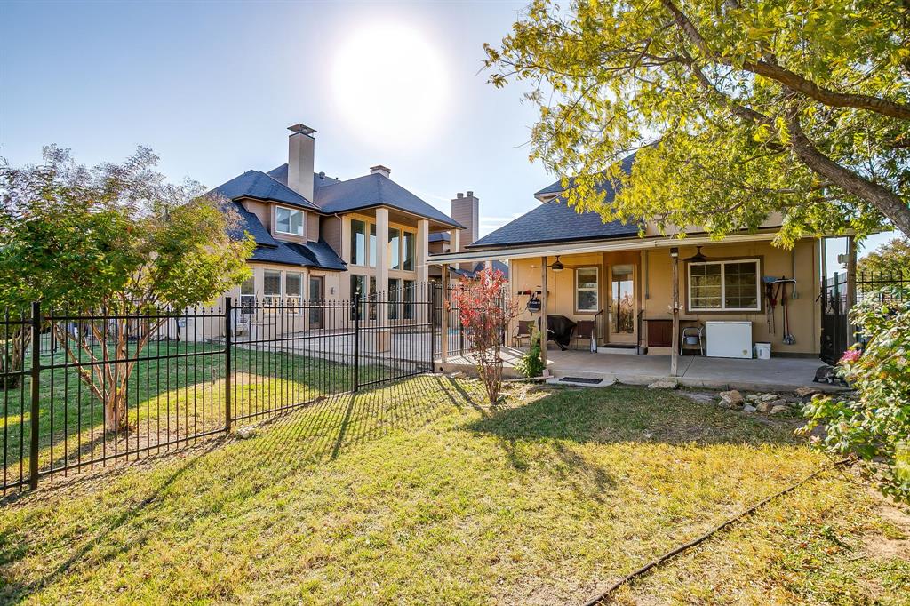 253 Bayne Road Haslet, TX 76052 - Photo 33 of 40 a view of a house with swimming pool and sitting area