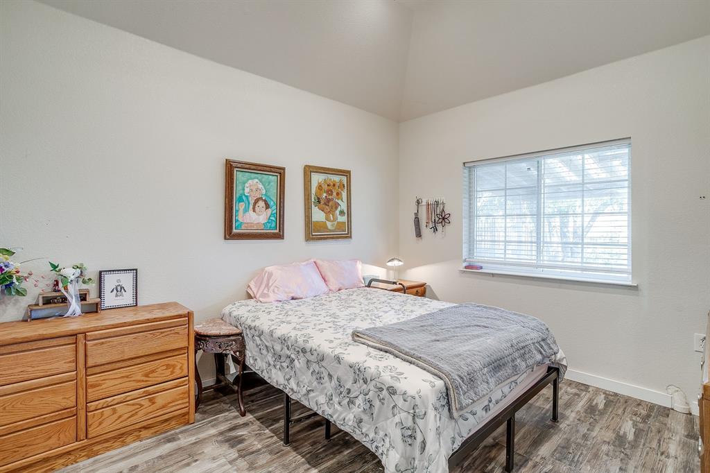 253 Bayne Road Haslet, TX 76052 - Photo 37 of 40 a bedroom with a bed and window