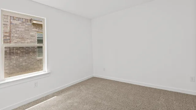 an empty room with a window