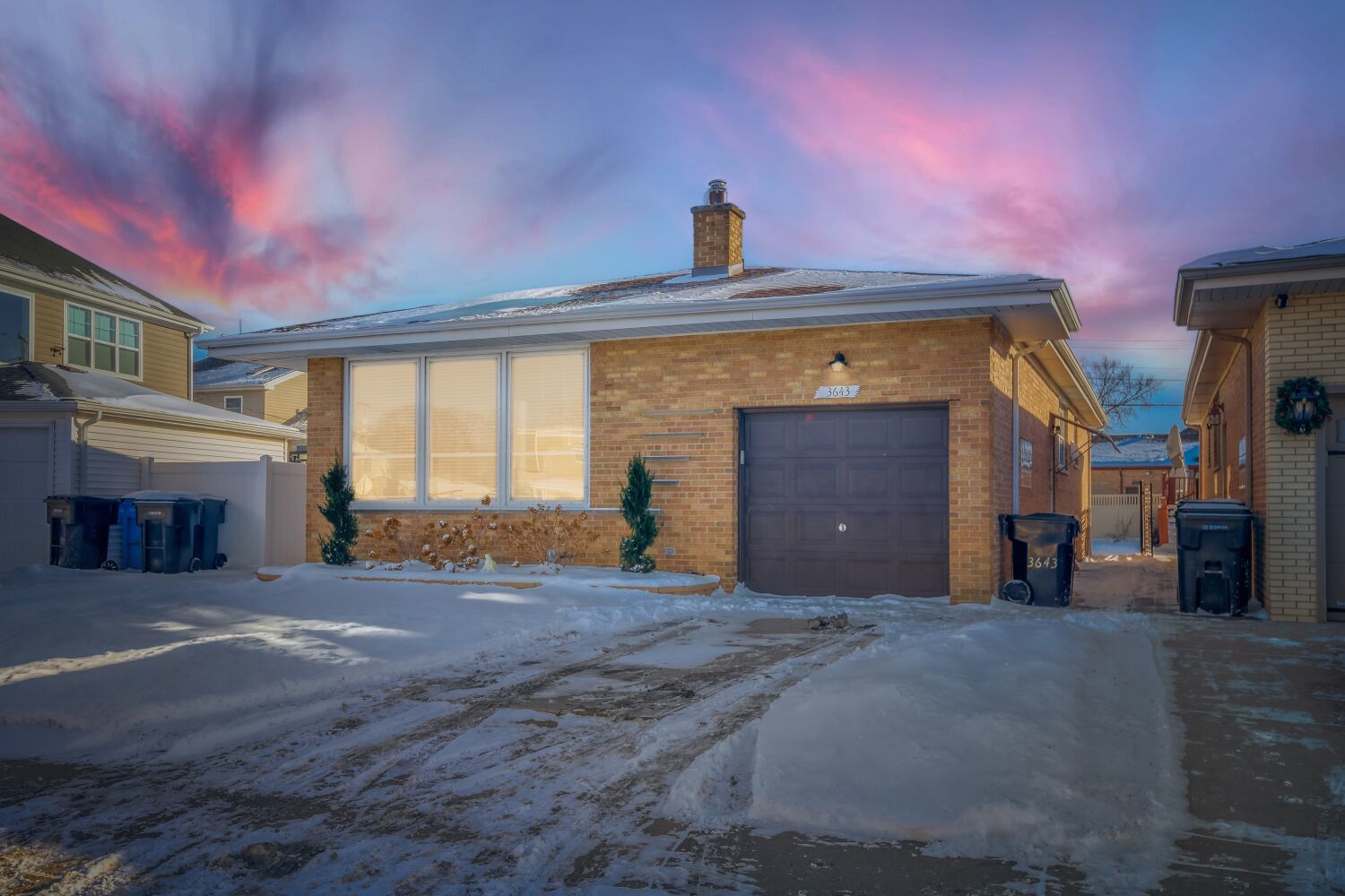3643 West 113th Street Chicago, IL 60655 - Photo 1 of 19 a front view of a house with a yard and garage