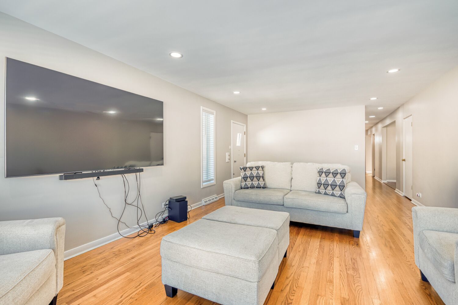 3643 West 113th Street Chicago, IL 60655 - Photo 5 of 19 a living room with furniture and a flat screen tv