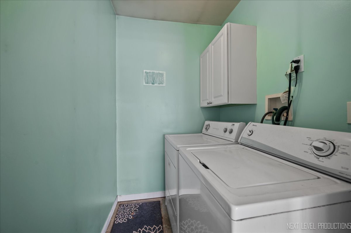 87 Saugatuck Road Montgomery, IL 60538 - Photo 20 of 27 a utility room with dryer and washer