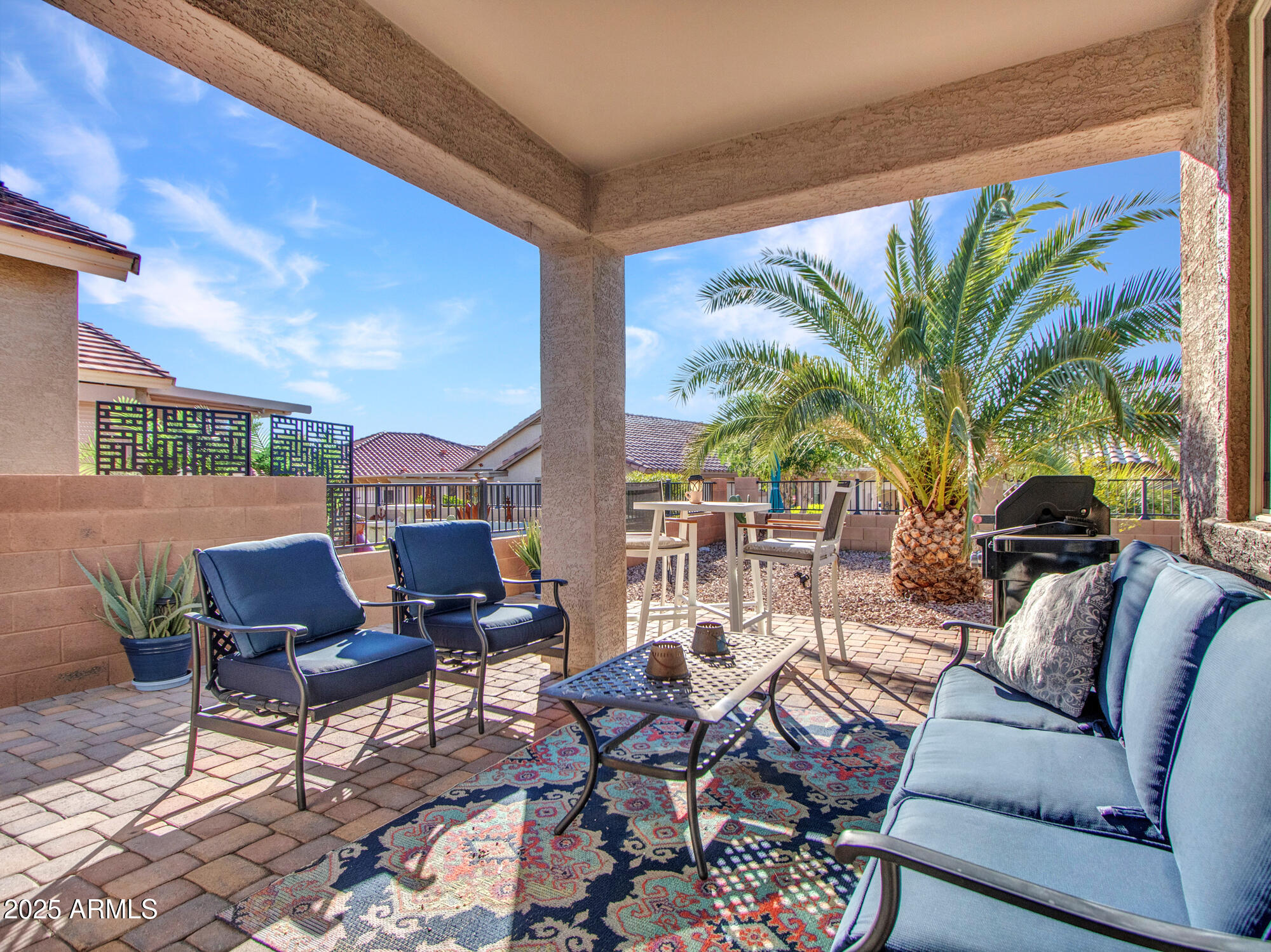 22585 West Moonlight Path Buckeye, AZ 85326 - Photo 20 of 35 a building outdoor space with patio furniture