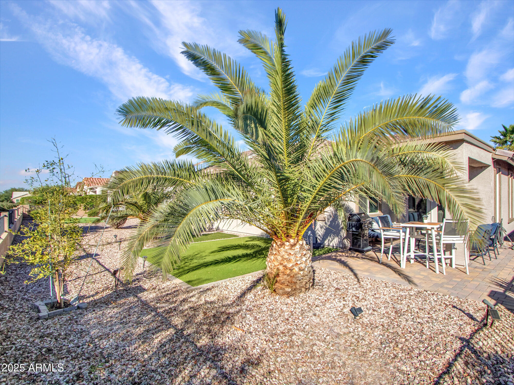 22585 West Moonlight Path Buckeye, AZ 85326 - Photo 26 of 35 a view of a backyard with a bench
