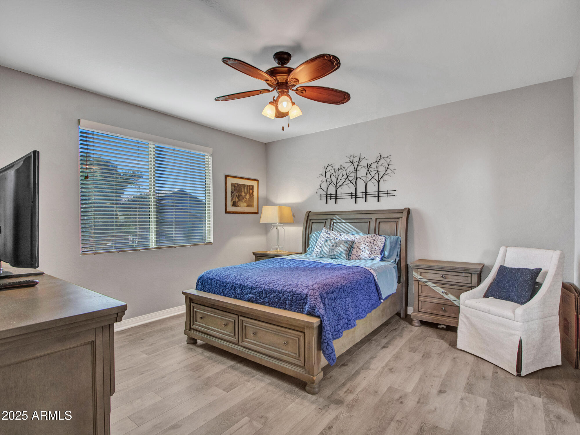 22585 West Moonlight Path Buckeye, AZ 85326 - Photo 27 of 35 a spacious bedroom with a bed and window