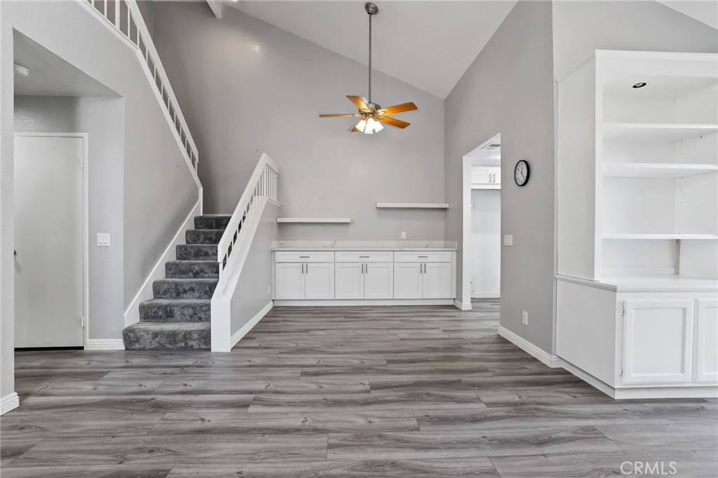 4 Gettysburg Irvine, CA 92620 - Photo 12 of 48 a view of an empty room with wooden floor and stairs