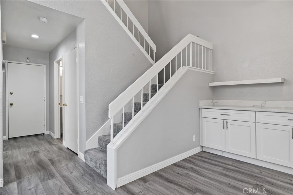 4 Gettysburg Irvine, CA 92620 - Photo 23 of 48 a view of an entryway with wooden floor