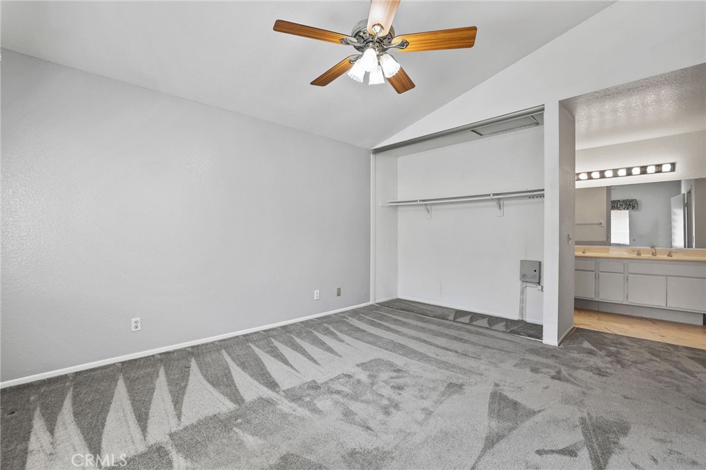 4 Gettysburg Irvine, CA 92620 - Photo 28 of 48 an empty room with a empty space and chandelier fan