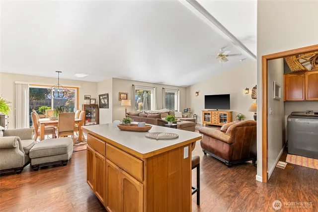 a view of living room with furniture and a flat screen tv