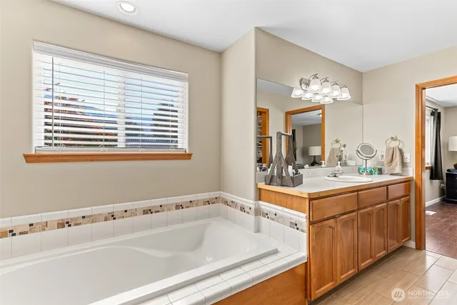 a bathroom with a sink and a bathtub