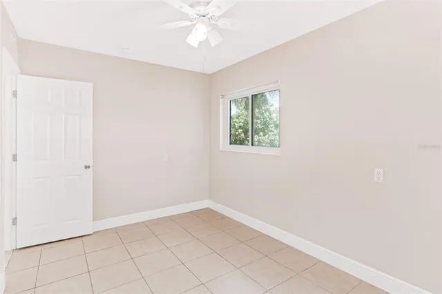 a backyard of a house with seating space