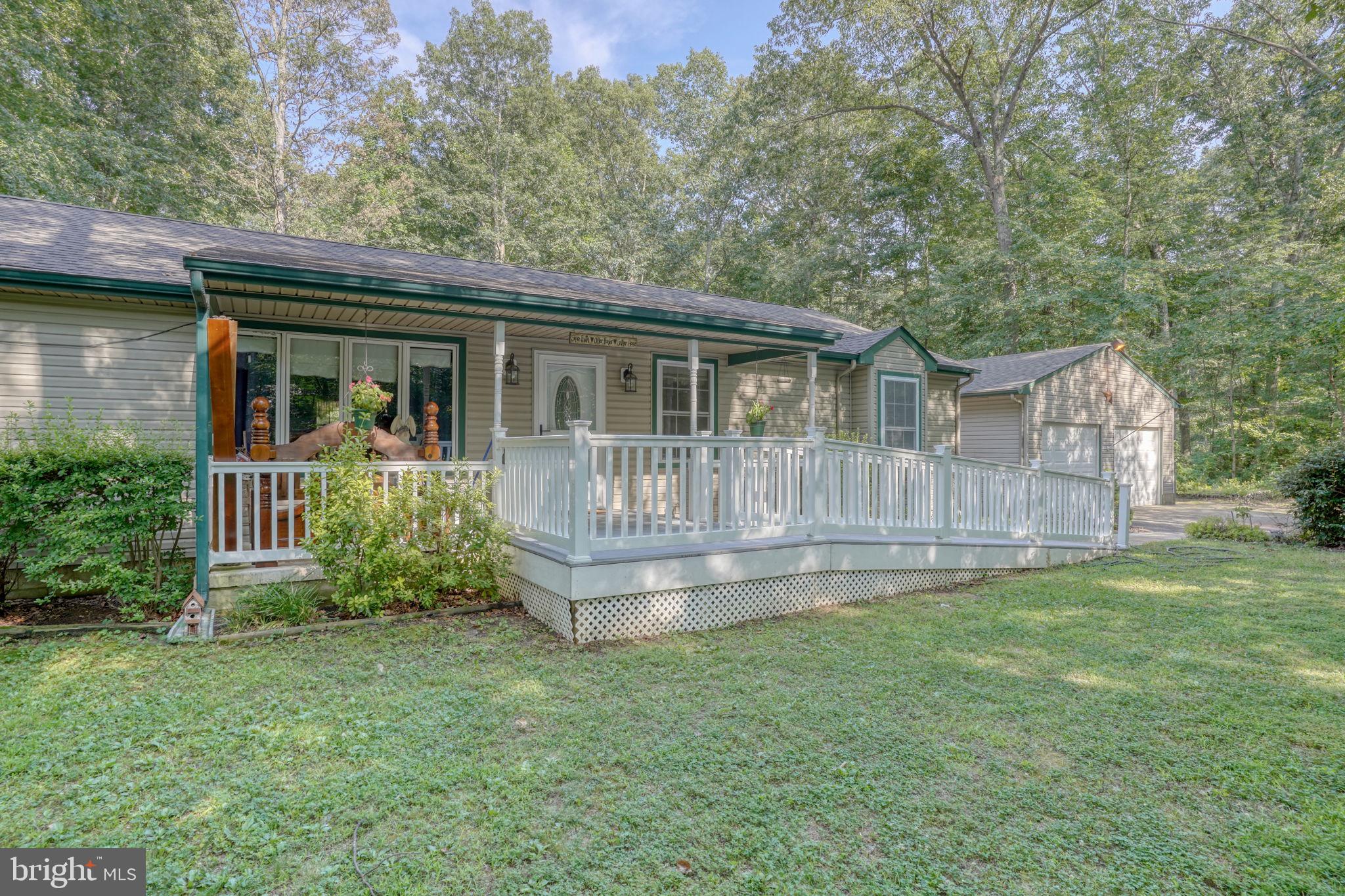 1332 Alley Mill Road Clayton, DE 19938 - Photo 2 of 50 a view of a house with a yard and a garden
