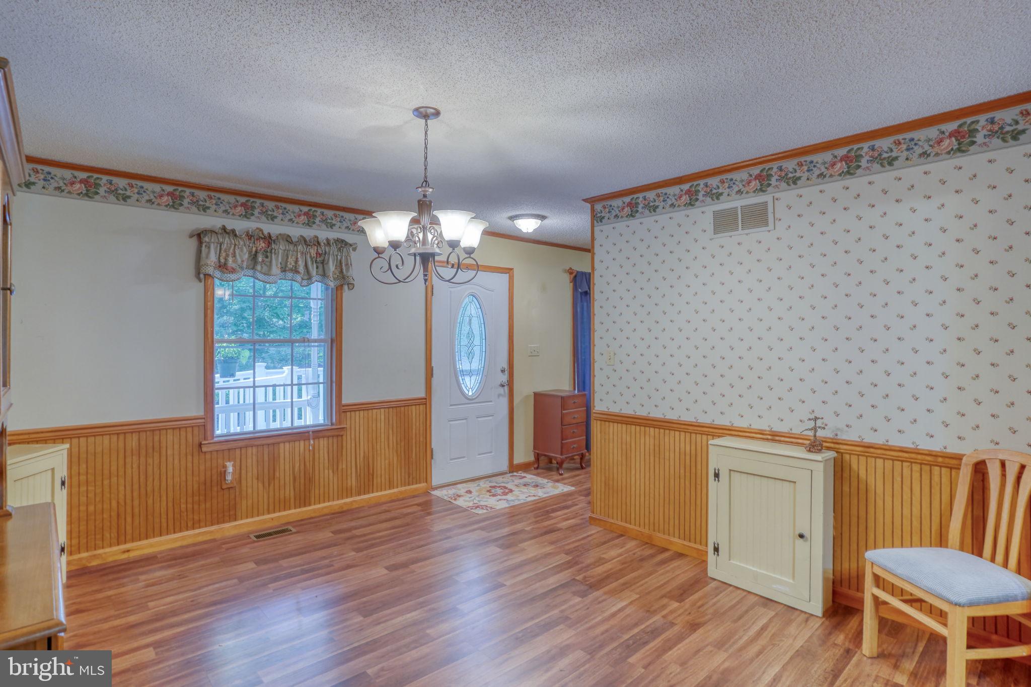1332 Alley Mill Road Clayton, DE 19938 - Photo 21 of 50 a view of a kitchen with wooden floor and a window