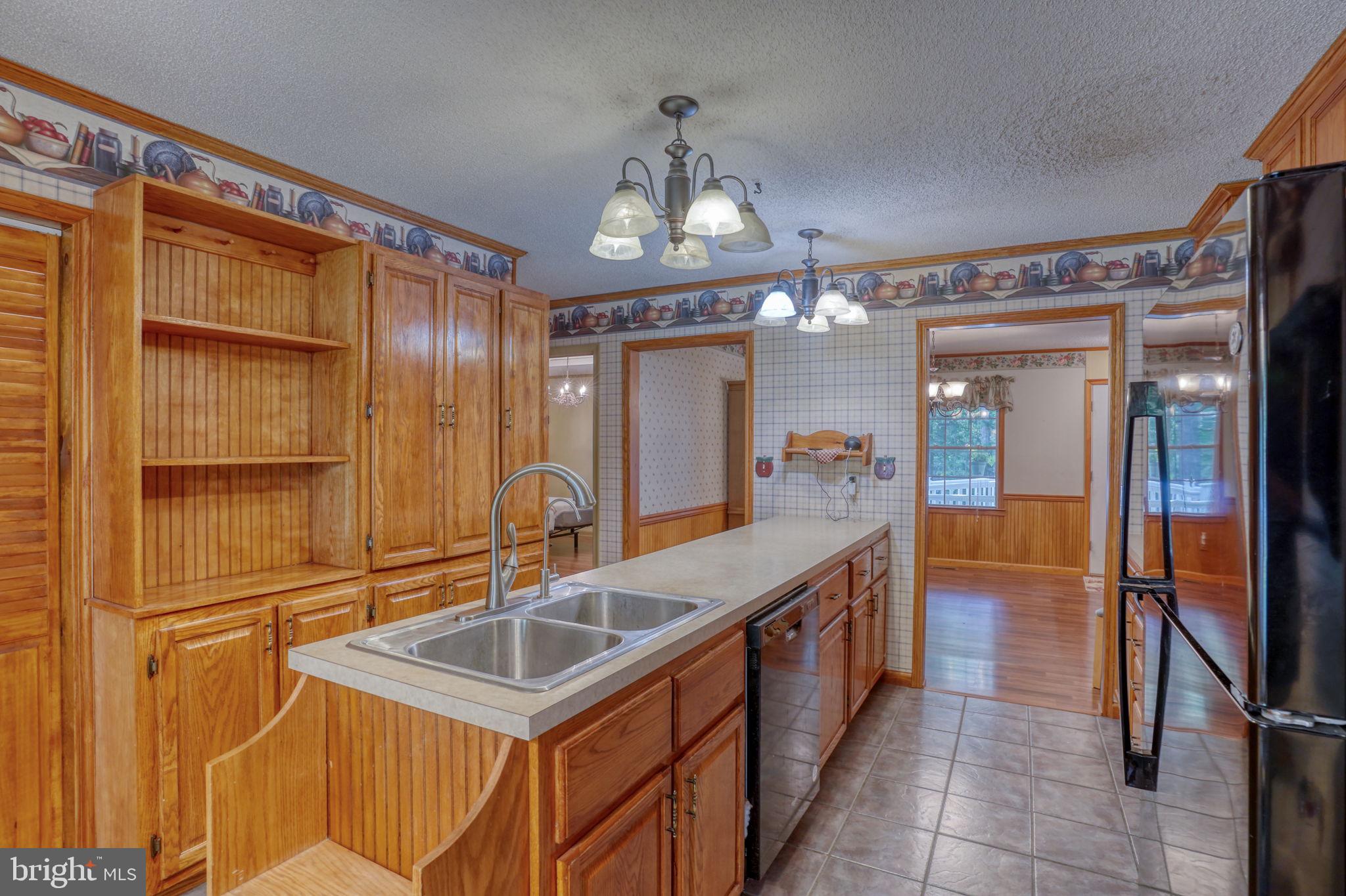 1332 Alley Mill Road Clayton, DE 19938 - Photo 23 of 50 a bathroom with a sink and a mirror