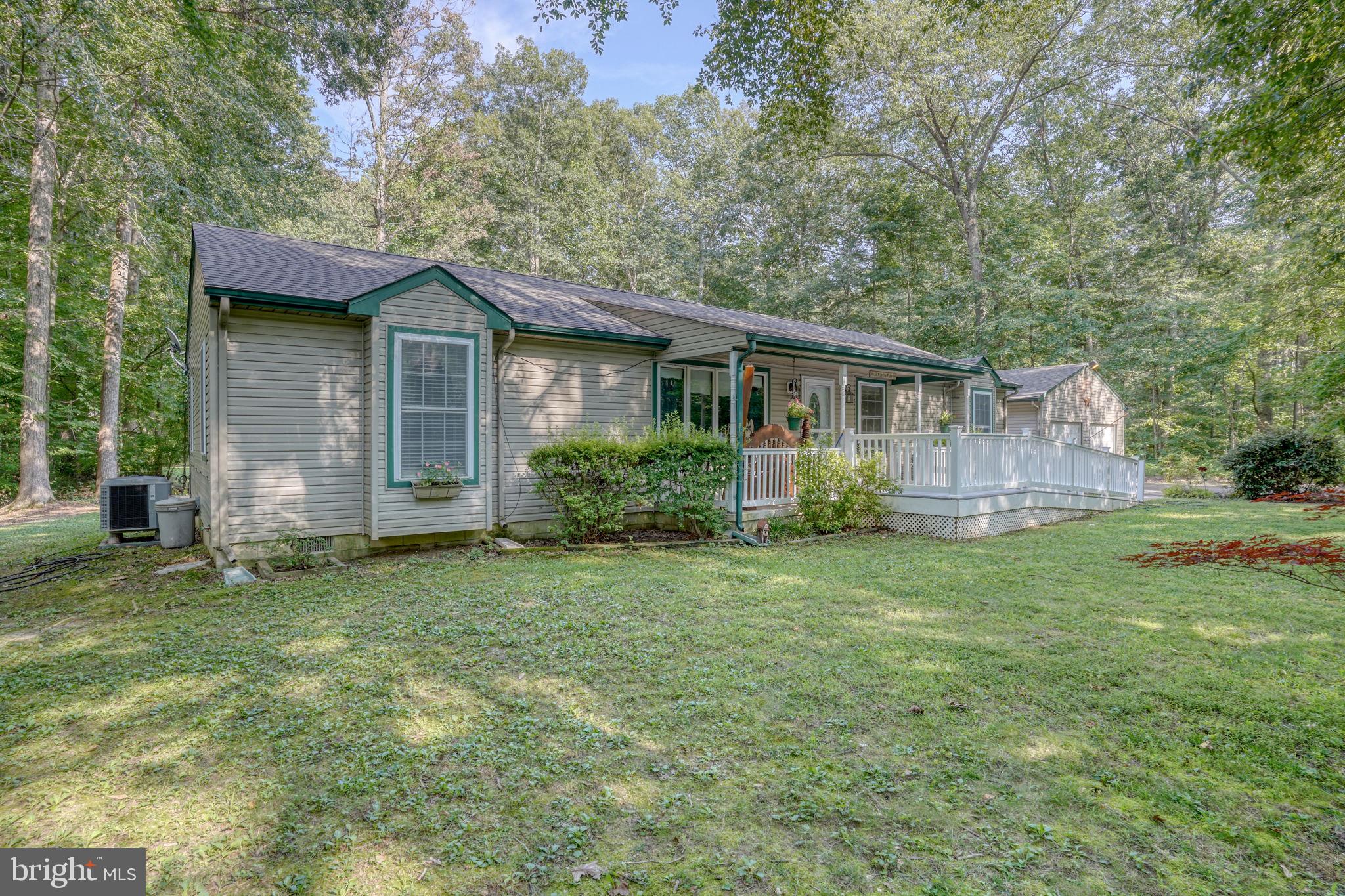 1332 Alley Mill Road Clayton, DE 19938 - Photo 4 of 50 a view of a house with yard and tree s