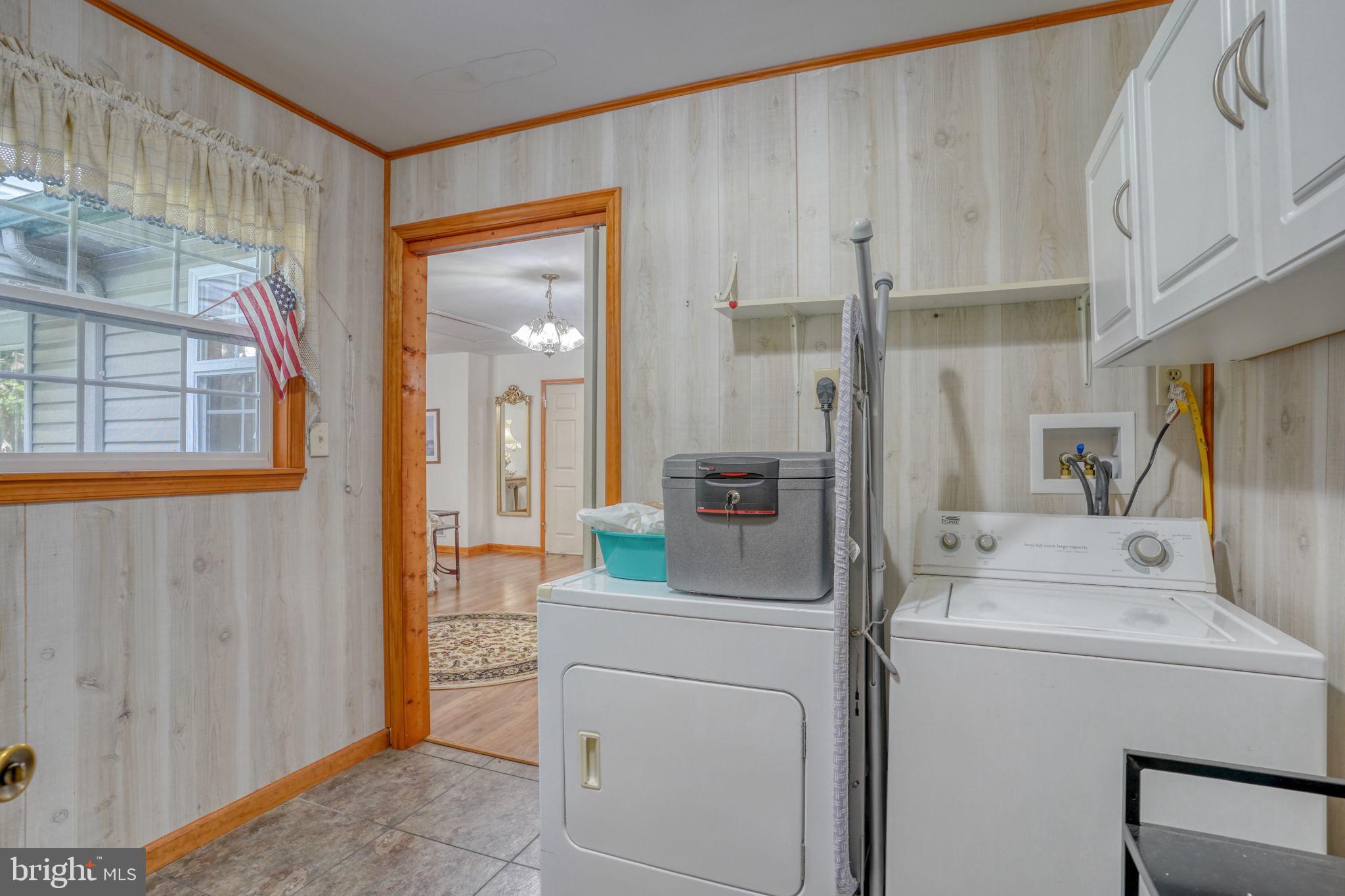 1332 Alley Mill Road Clayton, DE 19938 - Photo 49 of 50 a bathroom with a sink a toilet and a mirror