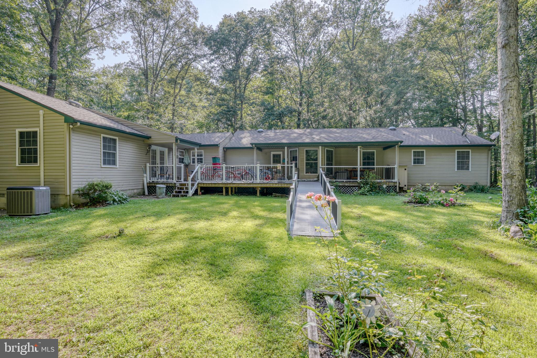 1332 Alley Mill Road Clayton, DE 19938 - Photo 10 of 50 a view of a house with backyard and sitting area