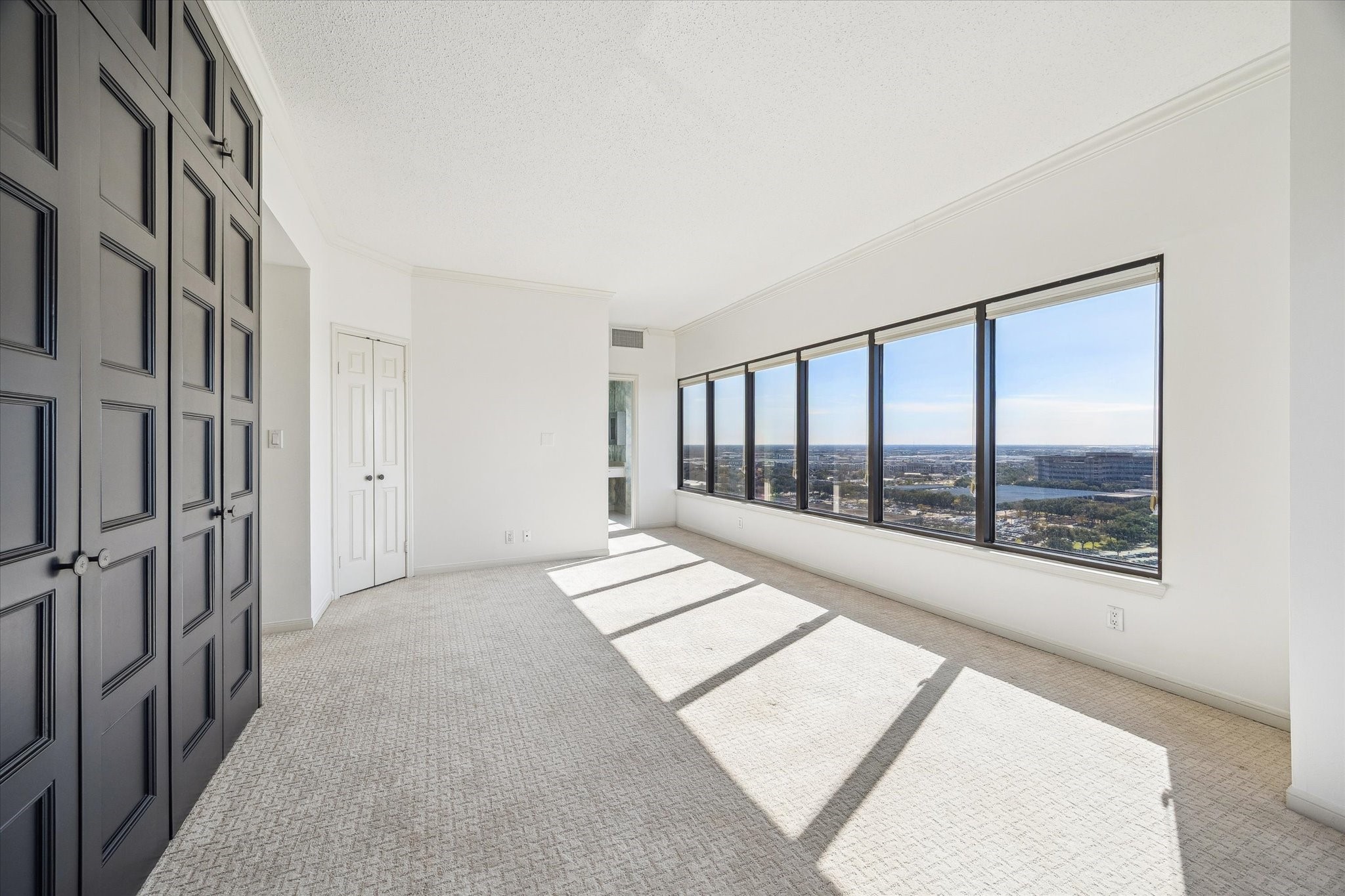 2001 Holcombe Boulevard, Unit 1801 Houston, TX 77030 - Photo 11 of 47 a view of an empty room with a window
