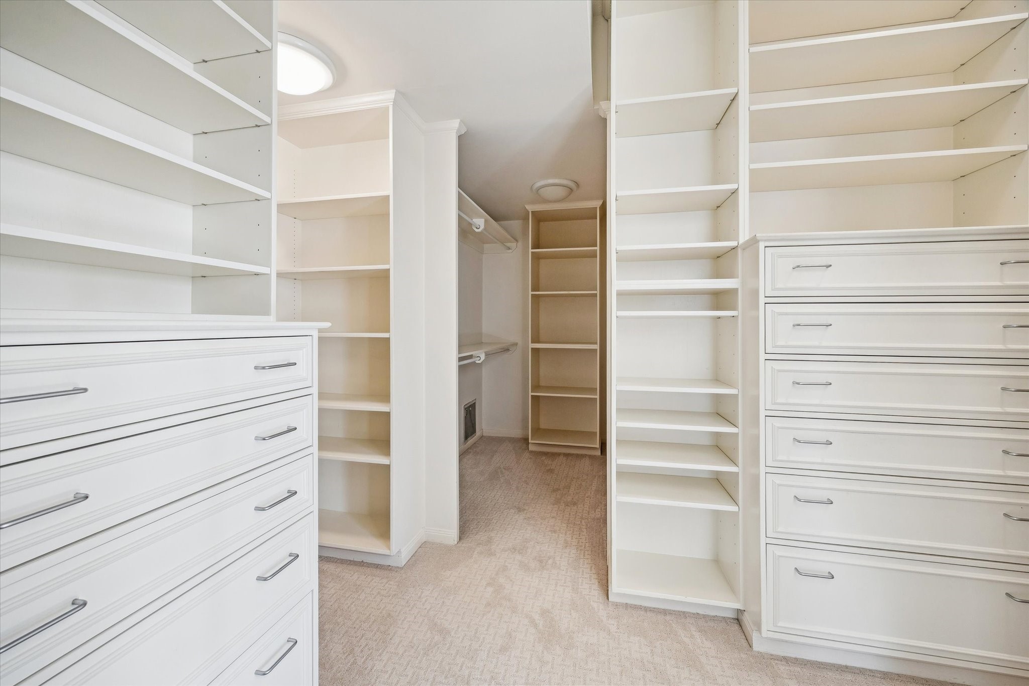 2001 Holcombe Boulevard, Unit 1801 Houston, TX 77030 - Photo 14 of 47 a view of walk in closet with clothes and shoes