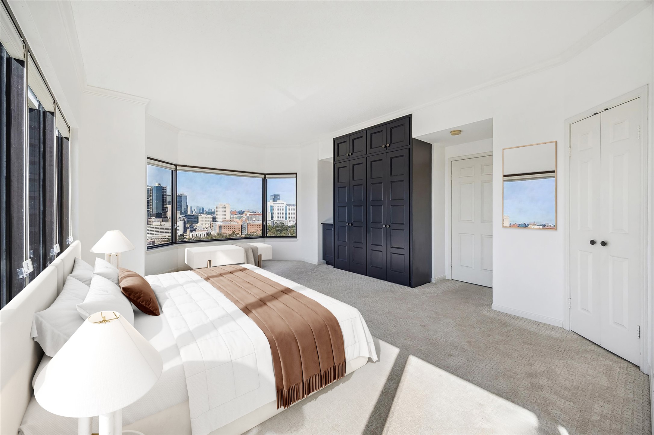 2001 Holcombe Boulevard, Unit 1801 Houston, TX 77030 - Photo 3 of 47 a large bedroom with a bed and a refrigerator