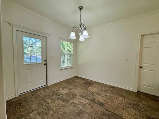 a view of an empty room with window