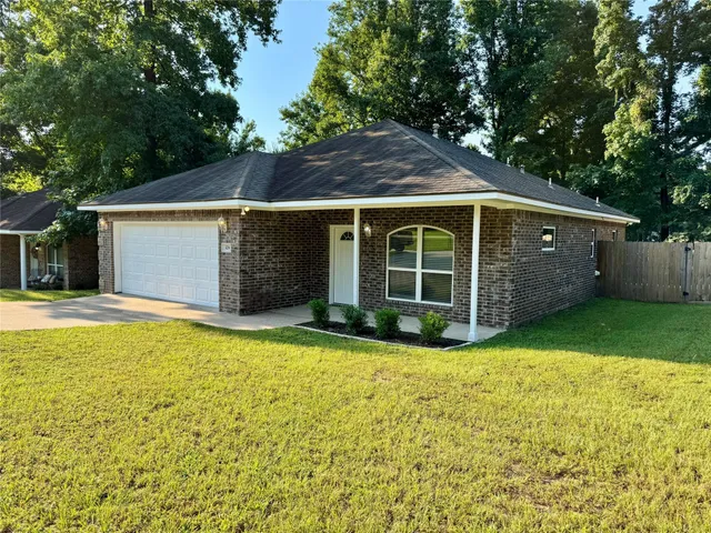 a view of a backyard with a garden