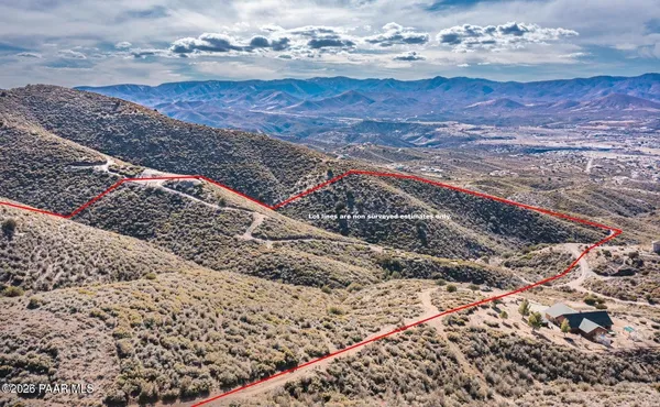 a view of water heater and covered with wooden floor