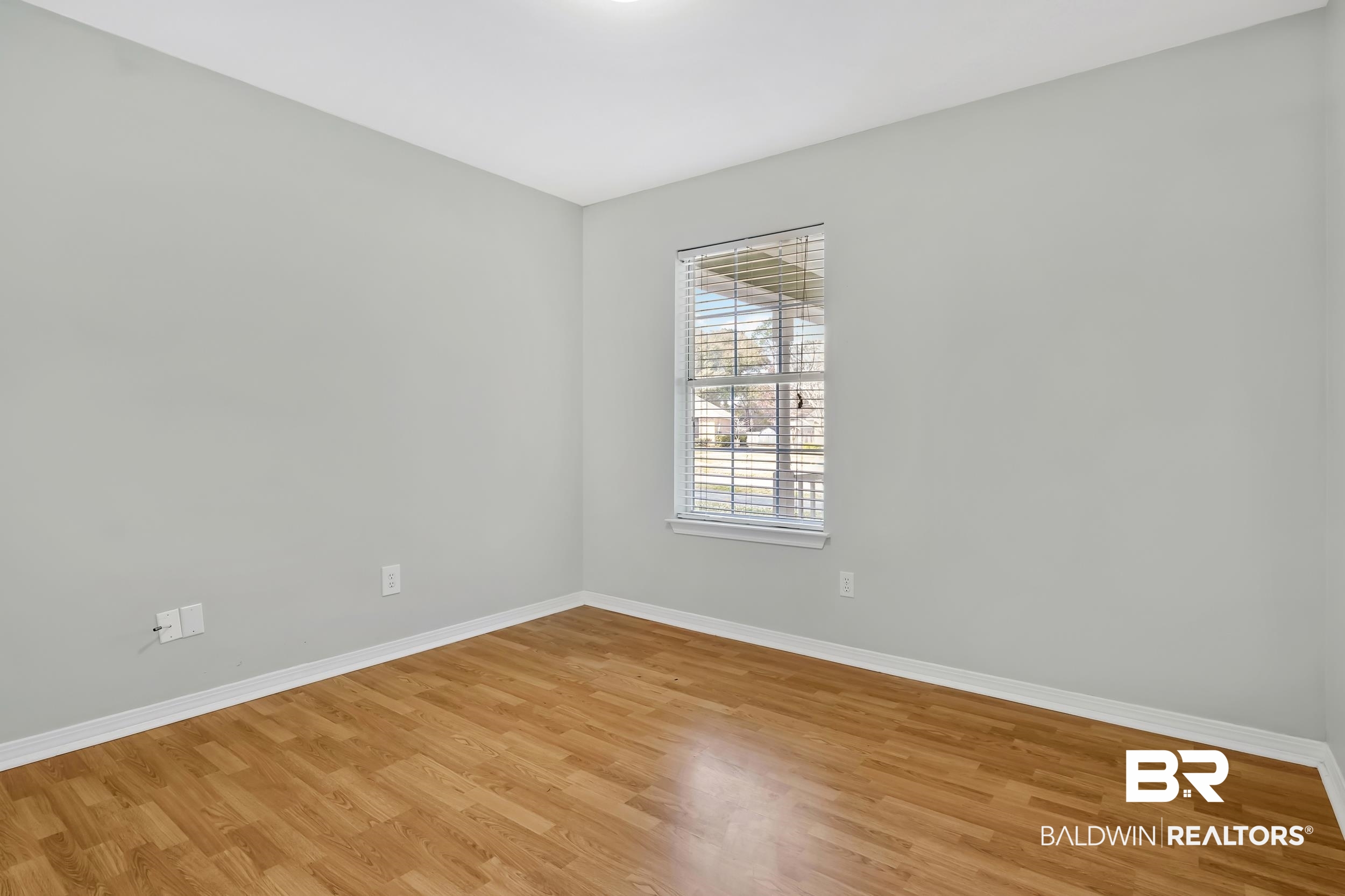 6616 Conde Court Mobile, AL 36695 - Photo 19 of 27 Unfurnished room featuring light wood finished floors and baseboards