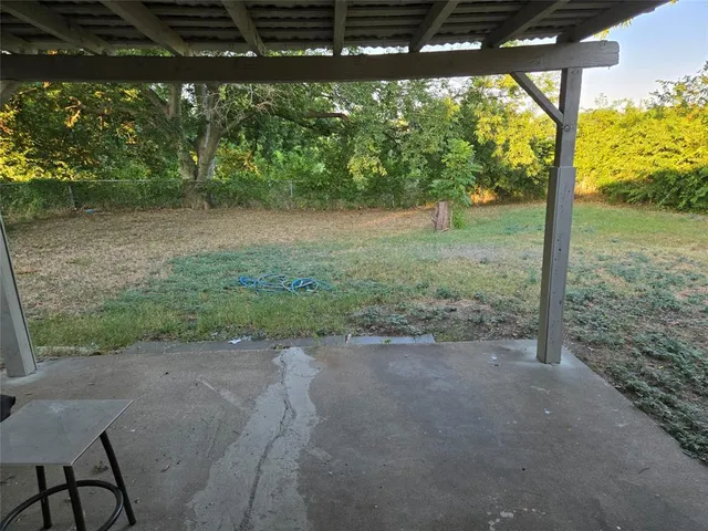 a view of a yard with porch