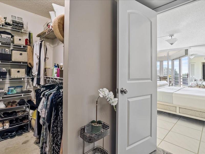 6200 Northwest 2nd Avenue, Unit 418 Boca Raton, FL 33487 - Photo 17 of 41 a view of a walk in closet