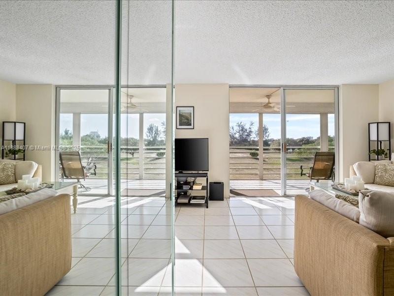 6200 Northwest 2nd Avenue, Unit 418 Boca Raton, FL 33487 - Photo 31 of 41 a room with a large window and a view of living room