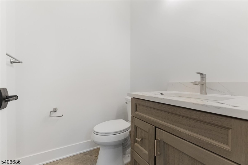 759 Mechlin Corner Road Hampton, NJ 08827 - Photo 23 of 45 a bathroom with a sink a toilet and mirror
