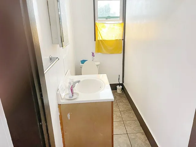 a bathroom with a sink and a vanity