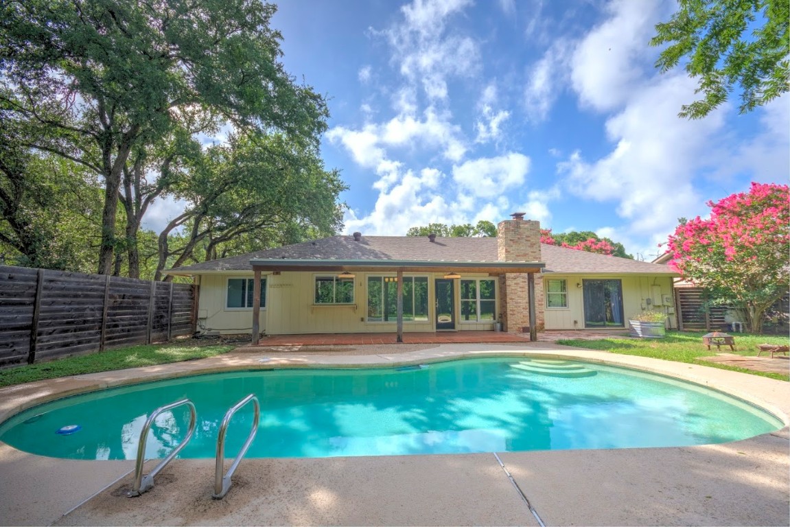 7000 Greenock Street Austin, TX 78749 - Photo 19 of 22 a front view of house with yard and green space