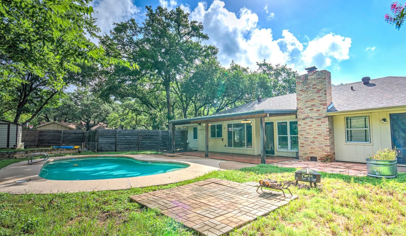 7000 Greenock Street Austin, TX 78749 - Photo 5 of 22 a view of a house with backyard porch and sitting area